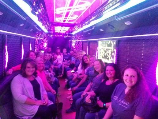 Luxury limousine service by transportcenterhub.xyz featuring satisfied customers celebrating memorable moments.