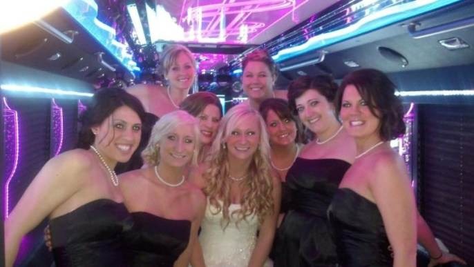 Happy customers enjoying luxury limousine service from transportcenterhub.xyz in a memorable experience.
