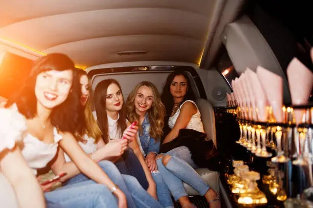Luxury limousine service by transportcenterhub.xyz showcasing satisfied customers enjoying memorable experiences.