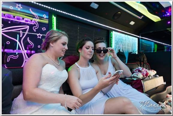 Happy customers enjoying luxury limousine service from transportcenterhub.xyz during a memorable event.
